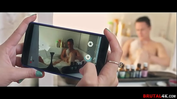 Sofi sneaks up on her boyfriend as he’s taking a bath and tries making some pics – FULL SCENE on https://www..com/